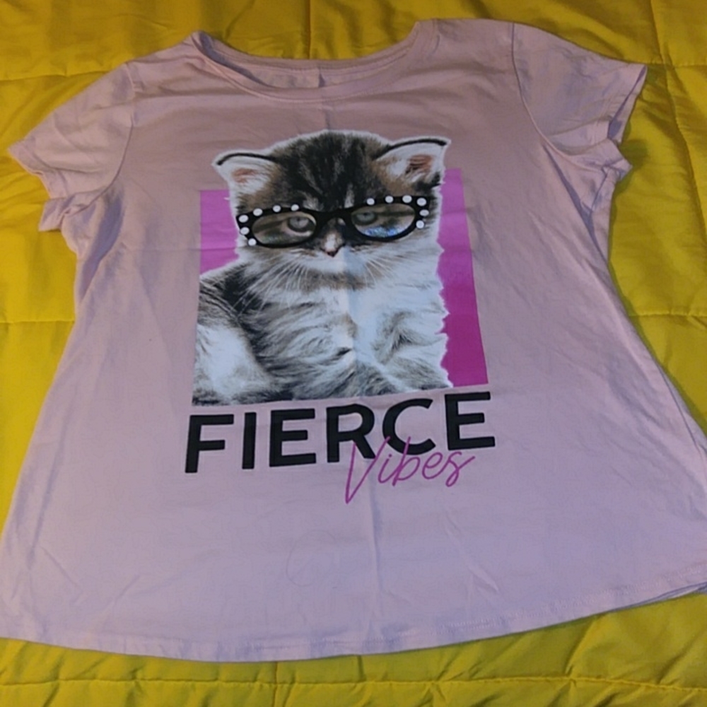 A pink shirt with a cat